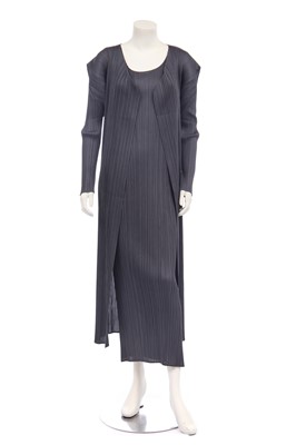 Lot 180 - An Issey Miyake pleated grey polyester two-piece ensemble, 2000s-modern