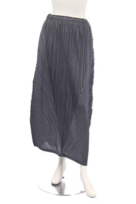 Lot 182 - A group of Issey Miyake pleated polyester garments in shades of grey and black, 2000s-modern