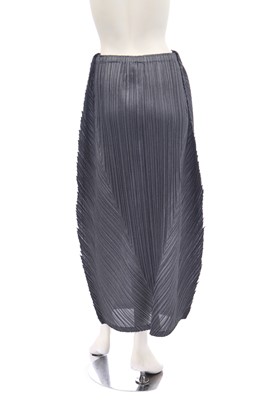 Lot 182 - A group of Issey Miyake pleated polyester garments in shades of grey and black, 2000s-modern