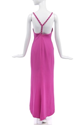 Lot 134 - A Versace fuchsia-pink silk-crêpe evening gown, 1998