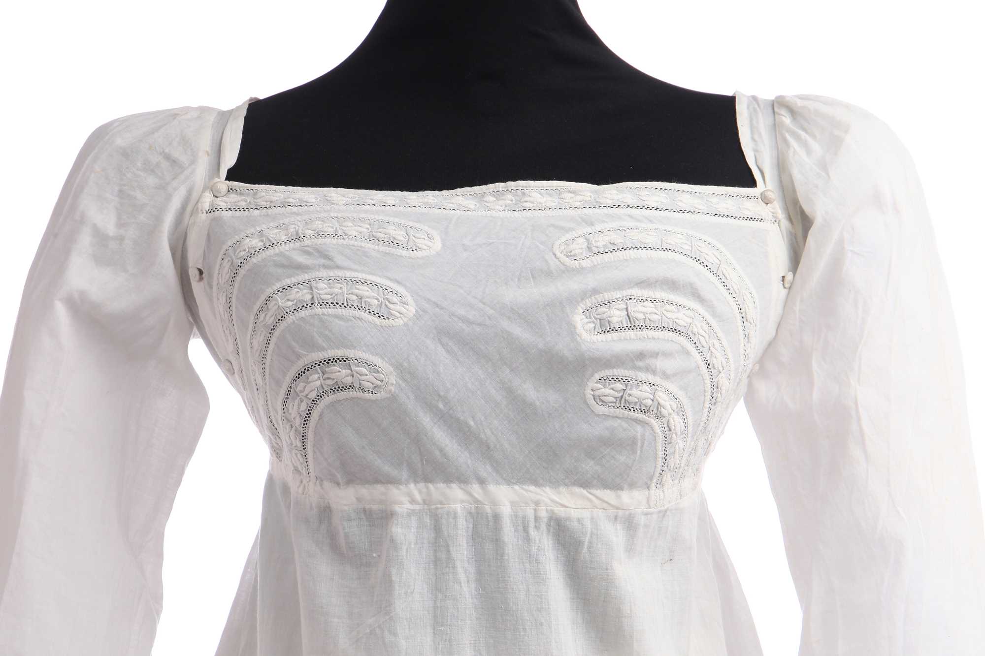 Lot 281 - A whitework embroidered empire-line dress,