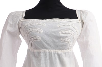 Lot 281 - A whitework embroidered empire-line dress, 1800-1810