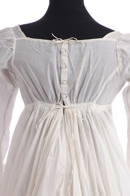 Lot 281 - A whitework embroidered empire-line dress, 1800-1810