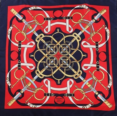 Lot 44 - An Hermès 'Eperon d'Or' silk scarf, marked...