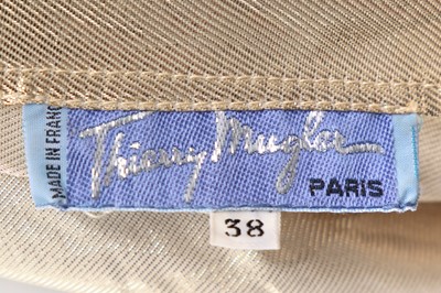Lot 191 - A Thierry Mugler pleated cloth of gold evening dress, Spring-Summer 1985