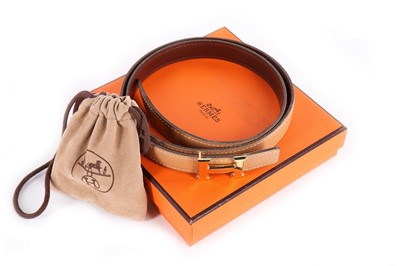 Lot 229 - An Hermès slim reversible leather belt, modern,...