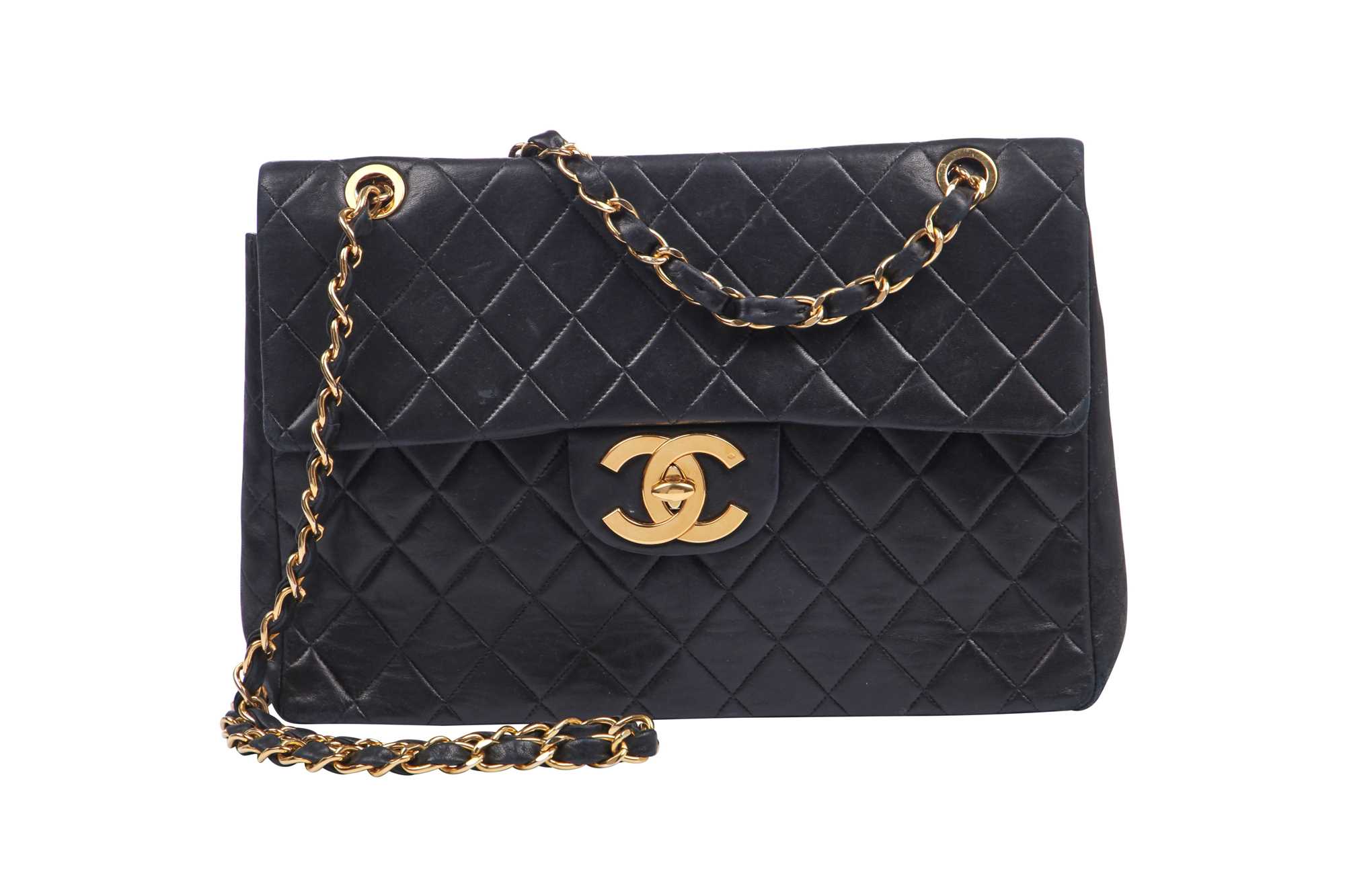Lot 4 - A Chanel quilted navy lambskin leather jumbo flap bag, circa 1994-96
