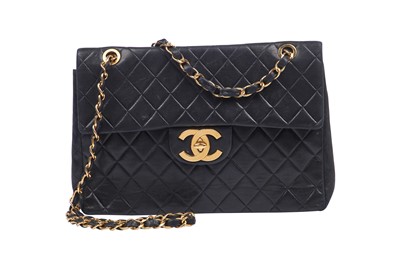Sold at Auction: CHANEL: A BLACK LAMBSKIN FLAP BAG WITH CHUNKY