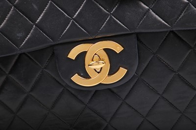 Lot 4 - A Chanel quilted navy lambskin leather jumbo flap bag, circa 1994-96