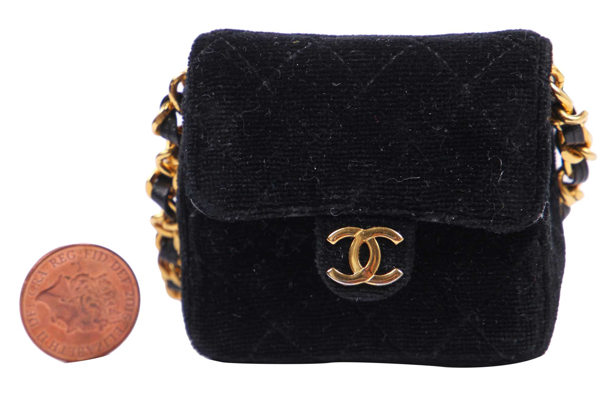 Lot 1 - A Chanel micro mini quilted velvet bag