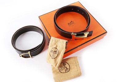 Lot 230 - Two Hermès leather belts, modern, stamped...