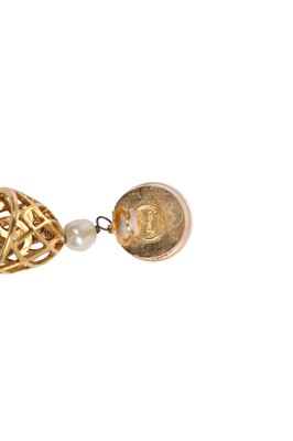 Lot 21 - A rare pair of Chanel 'birdcage' 'bell' clip-on earrings, circa 1990
