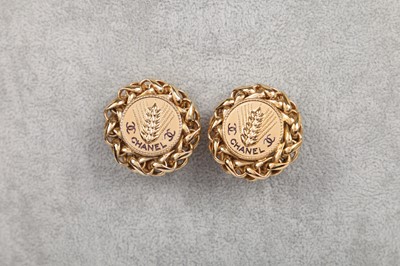 Lot 25 - A pair of Chanel gilt metal clip-on earrings, Autumn-Winter 1986-87 couture collection