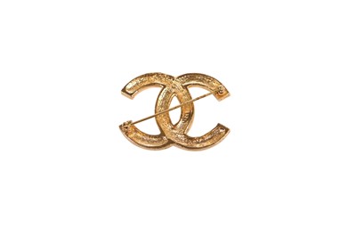 Lot 28 - Two Chanel gilt metal brooches, 1980s-early 1990s