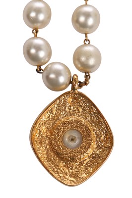 Lot 13 - A Chanel 'pearl' necklace with gilt metal diamond-shaped medallion with scroll work, circa 1990