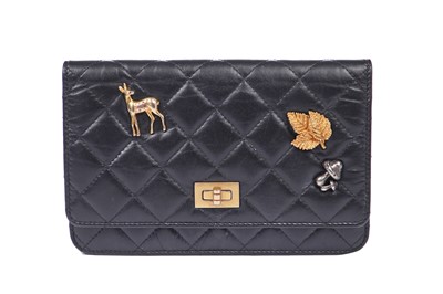 Lot 2 - A Chanel quilted black lambskin leather WOC, probably Autumn-Winter 2018-19