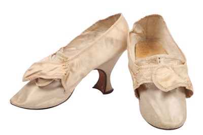 Lot 429 - A pair of ivory satin shoes, 1770s-80s