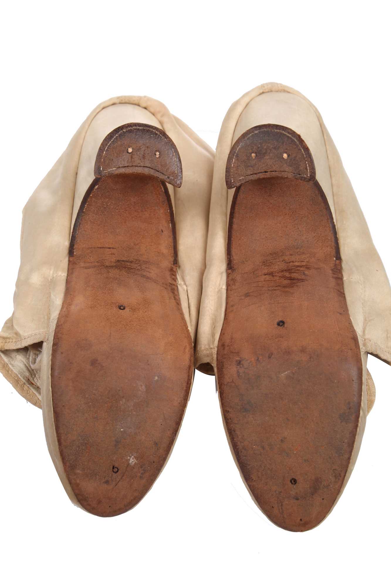 Lot 429 A pair of ivory satin shoes, 1770s80s,