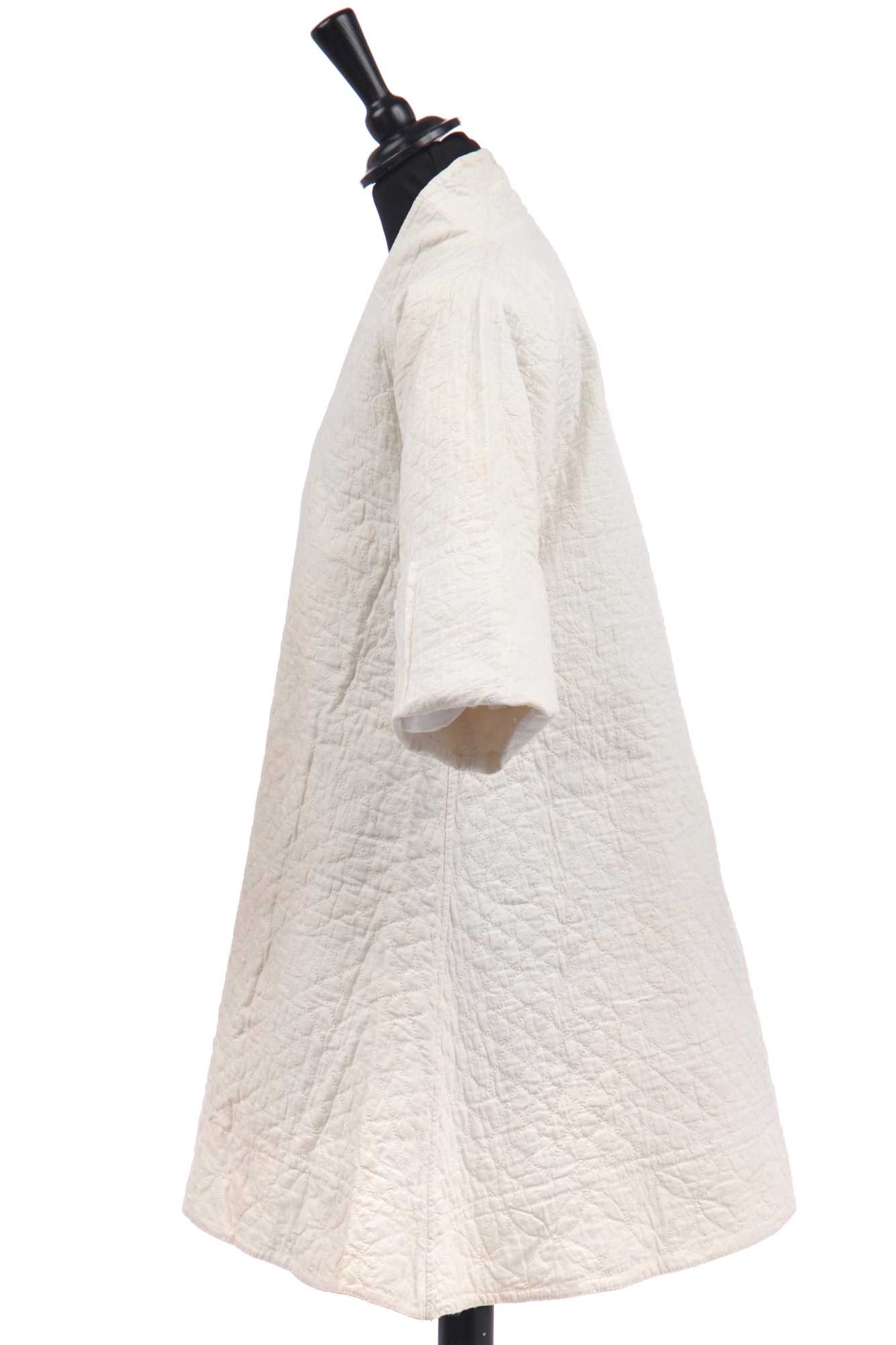 Lot 289 - A quilted linen bed robe, probably Irish,