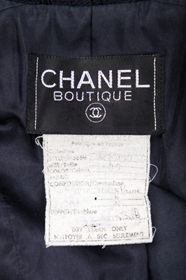 Lot 33 - A Chanel navy blue mohair tweed suit, 1980s