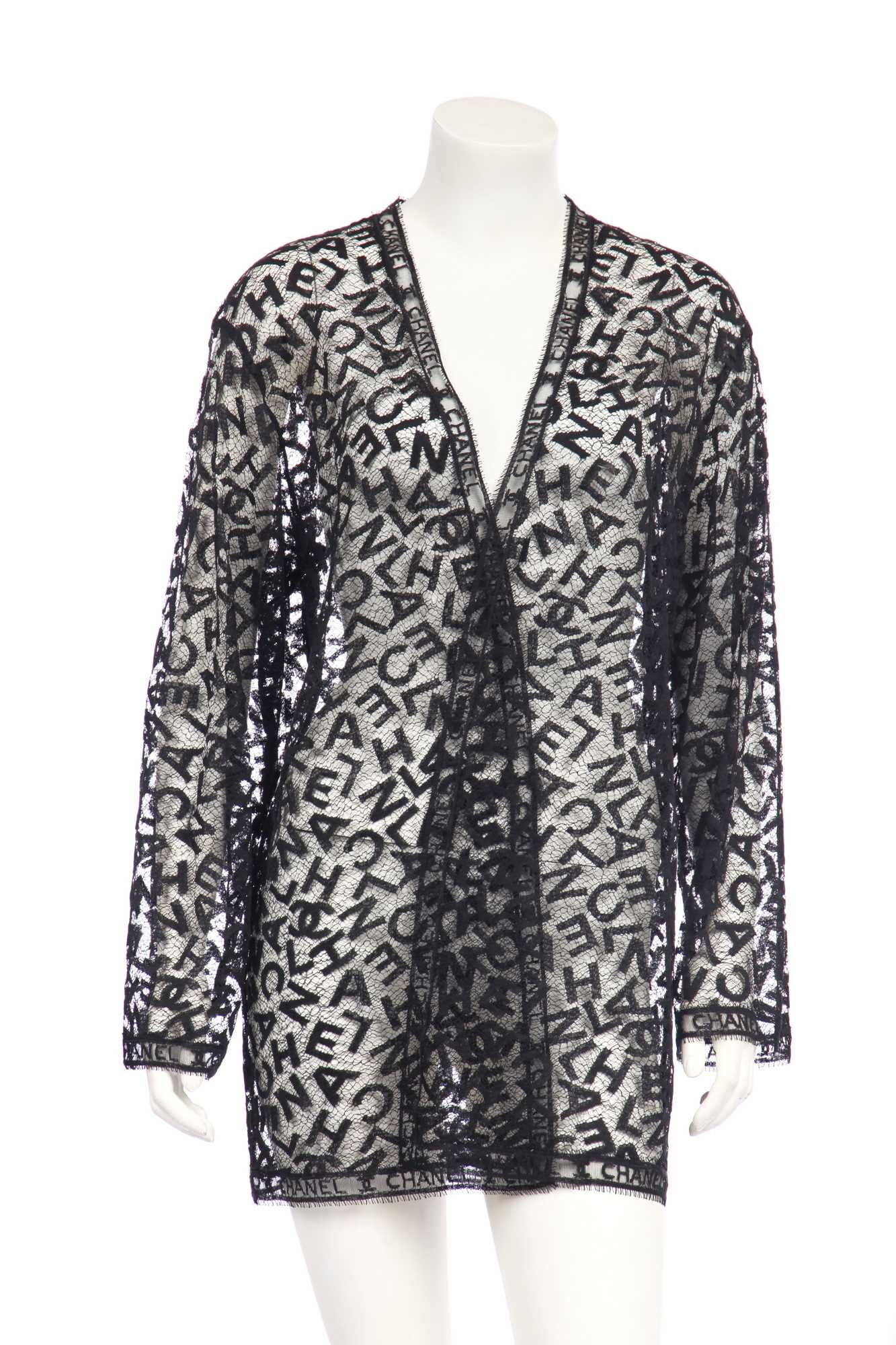 Lot 45 - A Chanel black lace jacket, 1990s