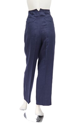 Lot 47 - A pair of Hermès dark blue linen trousers, 1990s