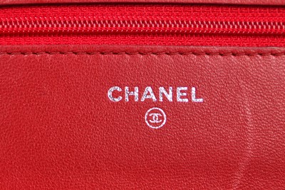 Lot 4 - A Chanel quilted red lambskin leather WOC, 2014