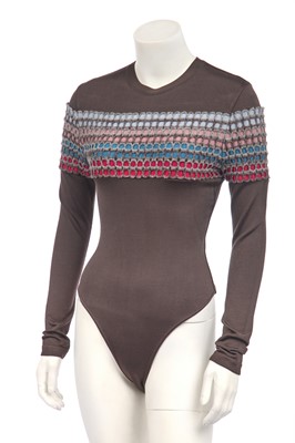 Lot 220 - An Azzedine Alaïa brown polyamide jersey bodysuit, late 1980s-early 1990s