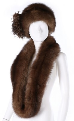 Lot 57 - A dark brown sable hat with ostrich feather...