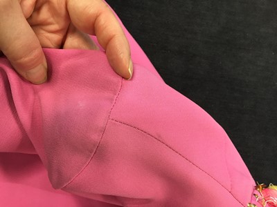 Lot 329 - A Christian Dior London beaded pink crêpe minidress, circa 1968
