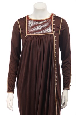 Lot 305 - A Bill Gibb brown Quiana jersey smock-style evening gown, Spring-Summer 1975