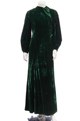 Lot 354 - A Saks Fifth Avenue bottle-green silk velvet evening coat, 1930s