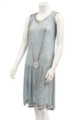 Lot 385 - A pale-blue beaded flapper dress, circa 1928