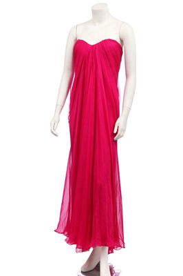 Lot 113 - An Alexander McQueen raspberry-pink silk chiffon evening gown, circa 2008