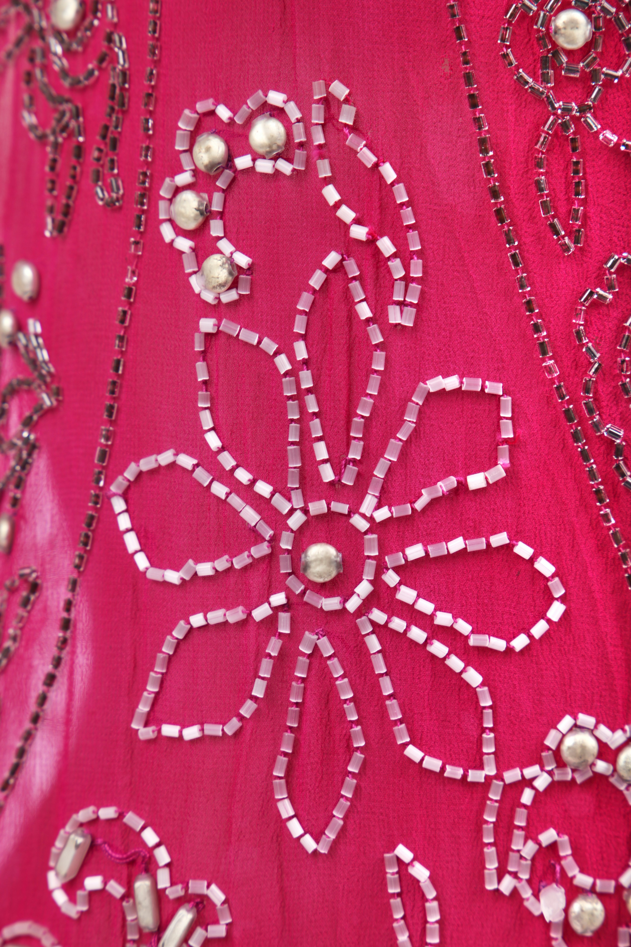 Lot 264 - A beaded raspberry-pink chiffon flapper