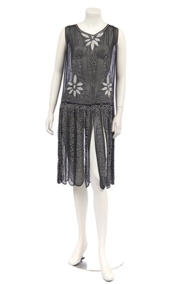 Lot 386 - A beaded black chiffon flapper dress, circa 1926