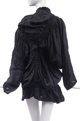 Lot 117 - An early Comme des Garçons ruched black synthetic top/dress, Spring-Summer 1984