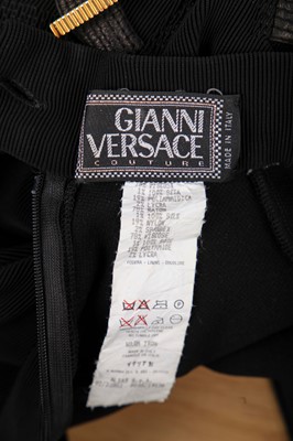 Lot 135 - A Gianni Versace black crêpe 'bondage' dress, Autumn-Winter 1992