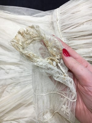 Lot 276 - A tamboured net bridal or summer gown, mid-1850s