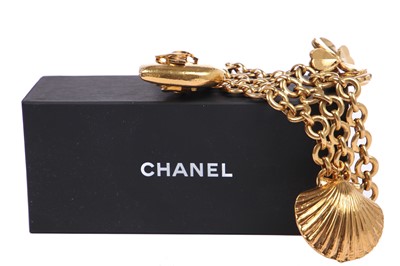 Lot 34 - A Chanel gilt metal charm bracelet, 1980s