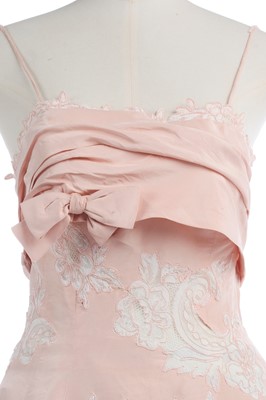 Lot 234 - A pink silk and lace evening gown, circa 1956
