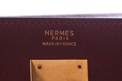 Lot 49 - An Hermès oxblood Box leather Retourné Kelly 32, 1978