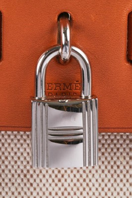 Lot 52 - An Hermès canvas and natural leather Herbag, modern