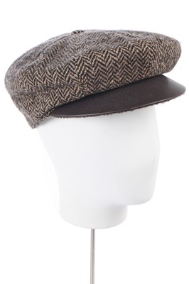 Lot 62 - An Hermès herringbone tweed flat cap, modern