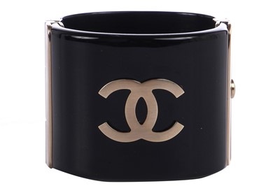 Lot 35 - A Chanel black resin cuff, Spring 2014