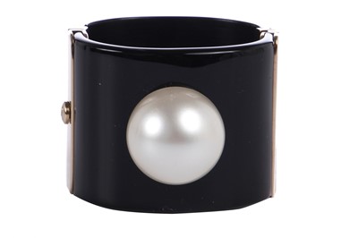 Lot 35 - A Chanel black resin cuff, Spring 2014