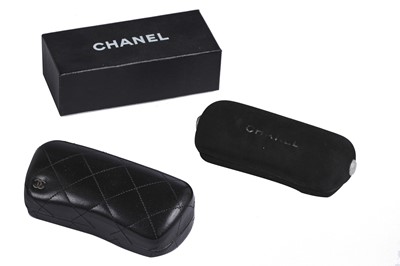 Lot 30 - Two pairs of Chanel sunglasses, 2000s