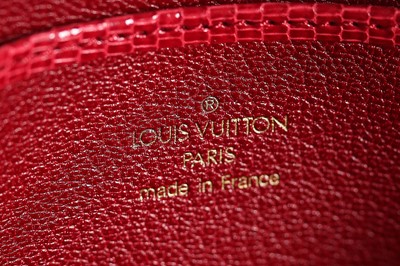 Lot 97 - A Louis Vuitton 'Ophelie' red lizard skin...