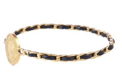 Lot 37 - A Chanel woven leather gilt chain bracelet, 1995