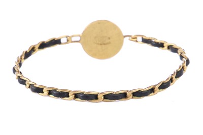 Lot 37 - A Chanel woven leather gilt chain bracelet, 1995